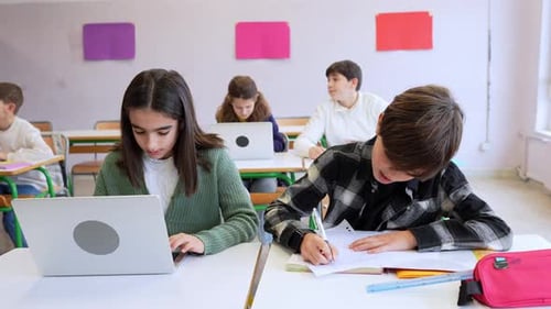 Teens Learning in Classroom Setting