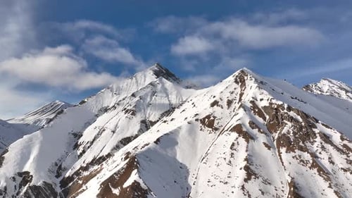 Aerial view of beautiful snowy mountains in Gudauri, Georgia