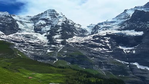 Mountainscape Of Mount Eiger In The Bernese Alps, Switzerland. Panning Shot
