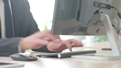 Close Up of Businessman Working on Computer, Using Mouse