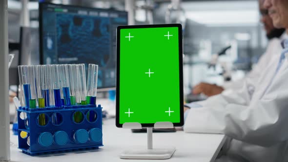 Lab Engineer Using Isolated Screen Tablet for DNA Data Analysis ...