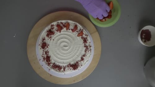 Topping Delicious Round Cake With Fresh Strawberry Fruits And Powdered Sprinkle. top view