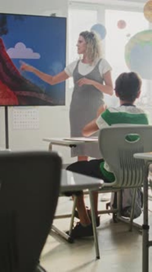 Teacher Discusses Volcano with Elementary School Students