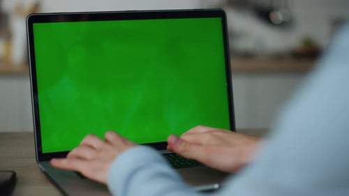 Hands Typing Greenscreen Laptop at Home Close Up