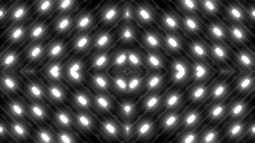 Dynamic glowing lights dance across a dark background seamlessly