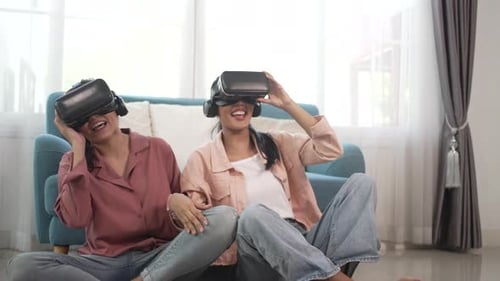 Two Women Enjoying Virtual Reality Gaming at Home