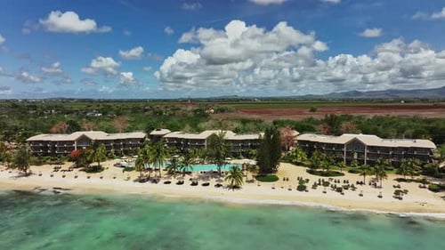 An aerial view of a resort on the beach