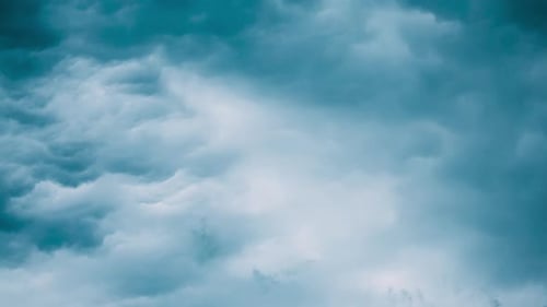 Storm Clouds Time Lapse in Teal Sky