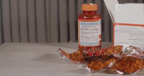 Vitamins and Medicine Pills on a Table