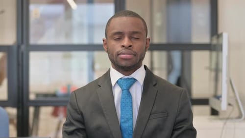 Portrait of Serious African Businessman in Office