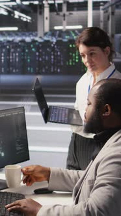 Vertical Video Happy Data Center Manager Providing Positive Feedback to Engineer