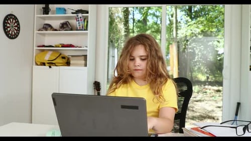 Child Learning Online with Laptop at Home Kid Studying Using Laptop in Classroom Kid Student Doing