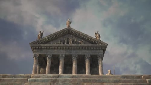 Historic Temple Structure with Sculptures Under a Blue Sky at Sunset