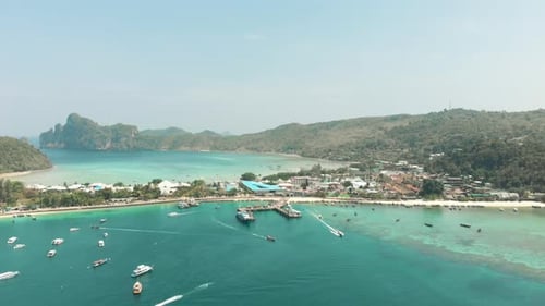 Top view of Ton Sai Pier busy boat traffic and Ton Sai Bay Paradise in Ko Phi Phi Don Island, Thaila