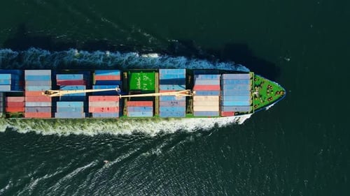 Container Ship Cruising Open Sea for Logistics Import Export