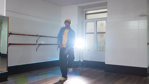 Energetic Afro Hip Hop Dancer Performing in Dance Studio