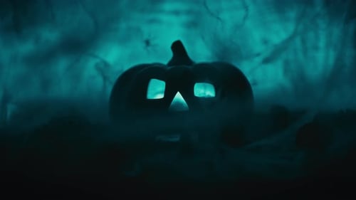 Glowing Jack-O-Lantern with Misty Spiderwebs