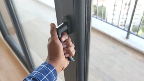 Hand Open Gray Plastic Pvc Window at Home at Early Morning
