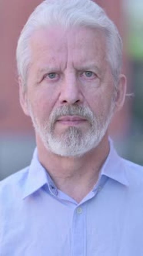 Senior Man's Portrait with a Calm Expression