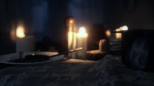 Cozy Christmas Dinner Table with Warm Flickering Candles