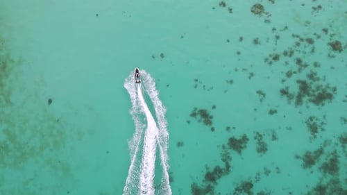 Jet Ski Ride in Turquoise Sea Water