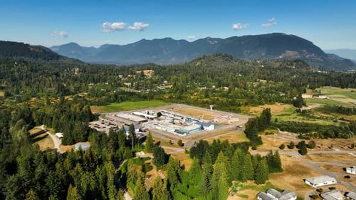 Flying To The Canada Service Correctional, Prison In Mission, British Columbia, Canada. - aerial