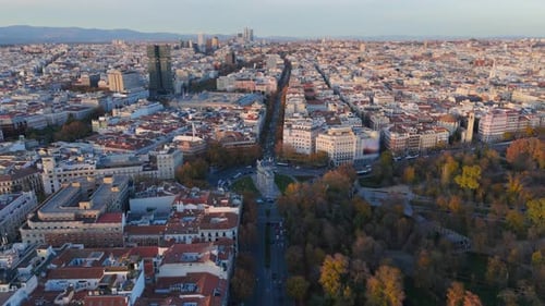 Experience the Stunning Aerial Views of Madrid at Sunset Showcasing the Iconic Puerta De Alcala
