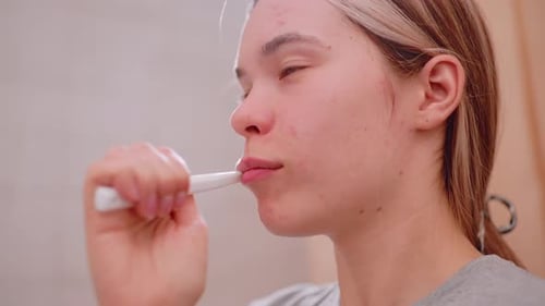 Close Up Side View Woman Brushing Teeth For Oral Hygiene