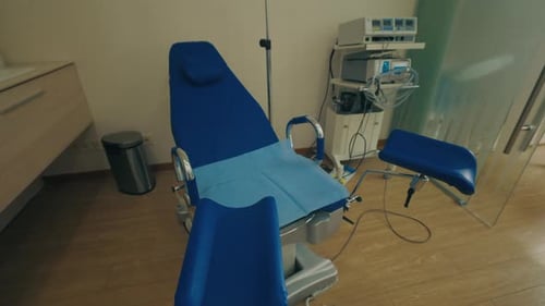 Interior of Gynecology Room in Medical Clinic Gynecological Bed in Obstetrics and Gynecology