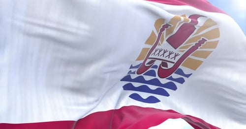 Realistic Waving Flag of French Polynesia Under Blue Sky