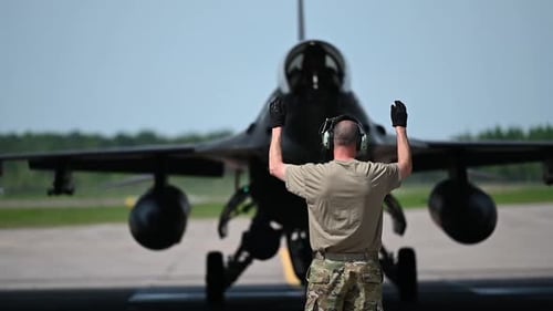 F-16 fighter jet arrives at the air base