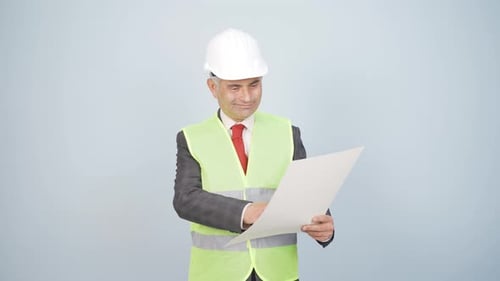 The engineer holding the project laughs.