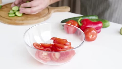 closeup man hands making salad