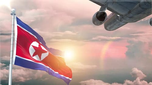 North Korea Flag Waving with Airplane Flying in Sunset Sky