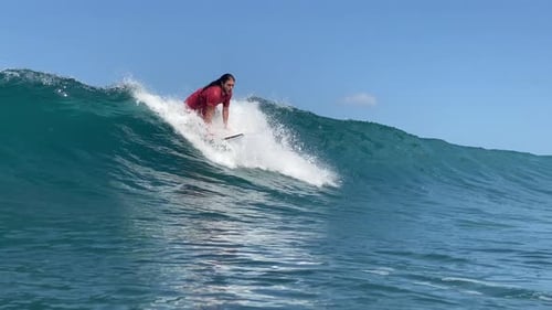 Young Man Surfing in the Ocean