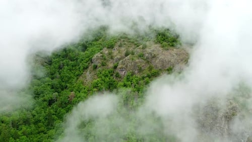 Clouds Over Green Mountain Forest at Summer Beautiful Nature Aerial Landscape with Morning Mist Fog
