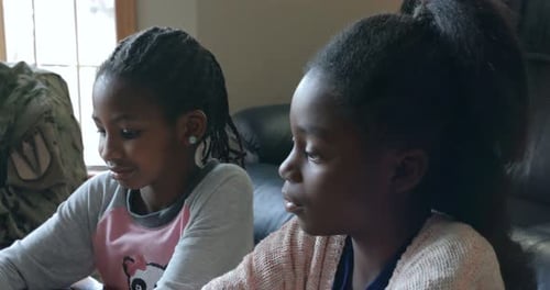 Two Girls Talking with an Adult Woman
