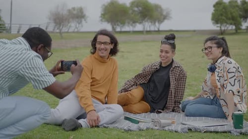 College Friends Posing for Photo on Green Lawn in Park