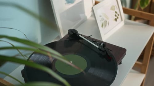 Record Player Spinning Vinyl Record in Home