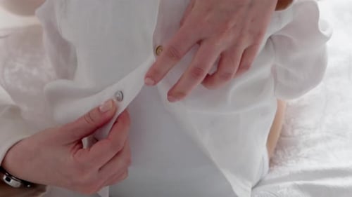 Buttoning White Shirt Top at Home