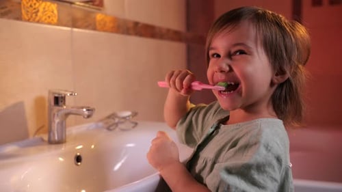 Little Girl Brushing Her Teeth