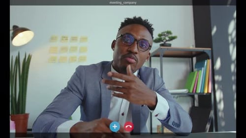 Close Up Shot of Screen African American Businessman Making Conference Video Call Meeting Sitting