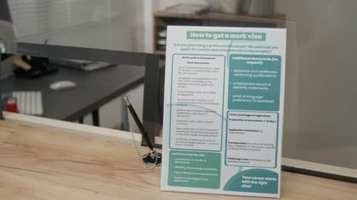 Leaflet with Work Visa Application Instructions at Embassy Service Counter