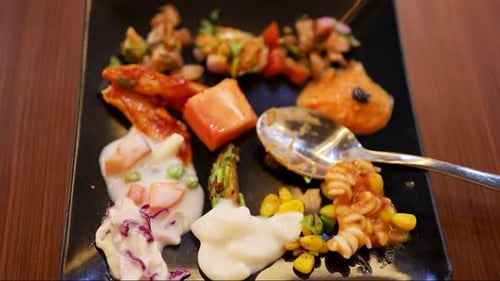 variety of fast food and healthy salads served on plate close up