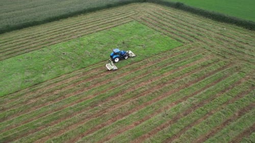 Aerial video of a tractor in the fields of Newport Berkeley in the UK