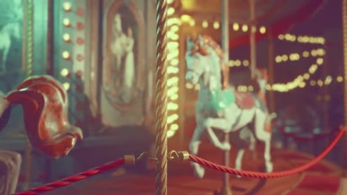 Empty Amusement Park at Night with Illuminated Carousel and Vibrant Lights