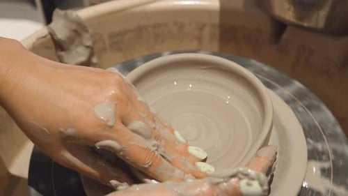 Woman Hands On Workshop In Ceramic Studio, Clay Molding Of A Ceramic Pottery. Close-up Shot