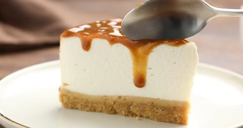 Slice of Creamy Cheesecake with Caramel Topping