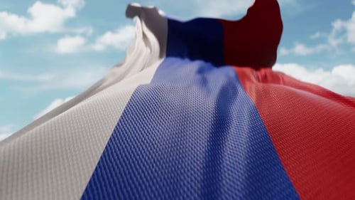 Realistic Flag Waving in Wind Against Blue Sky