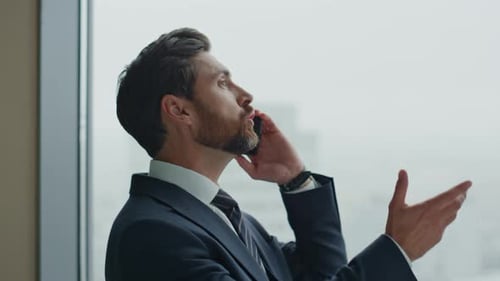 Boss Arguing Phone Conversation Yelling in Smartphone Close Up